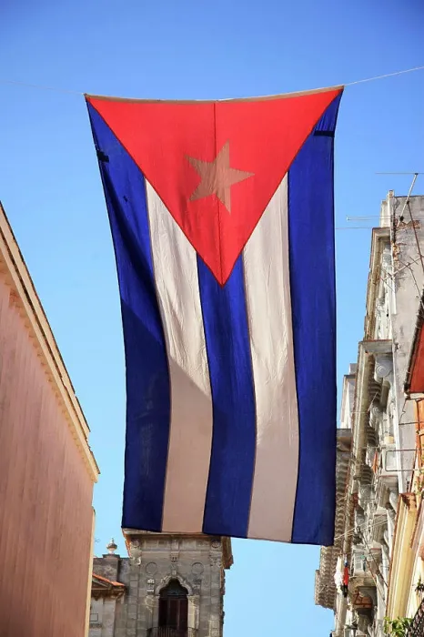 Framed Print : Flag of Cuba hanging between buildings in Havana Cuba Framed Print : Flag of Cuba hanging between buildings in Havana Cuba