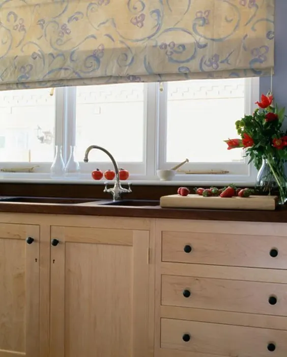 Framed Print : Floral blind on window above sink and chrome tap in fitted unit Framed Print : Floral blind on window above sink and chrome tap in fitted unit