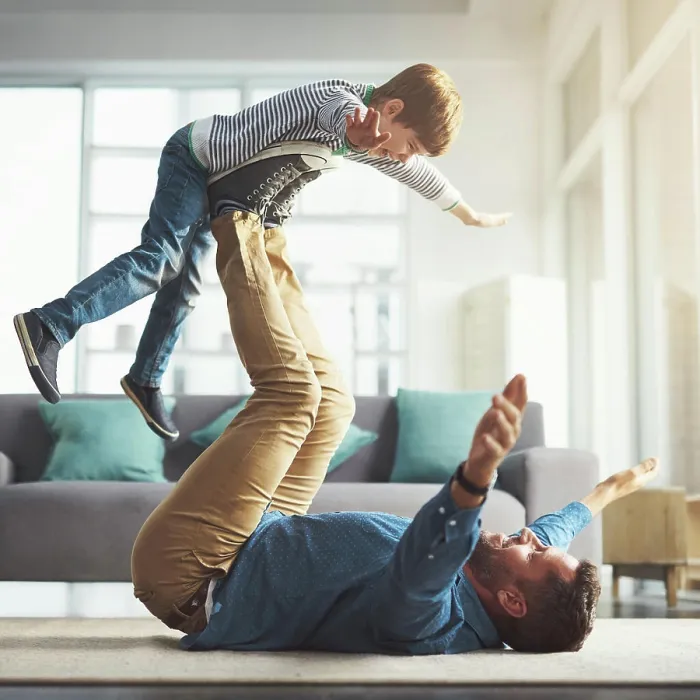 Framed Print : Flying, playing and dad with kid in home for bonding Framed Print : Flying, playing and dad with kid in home for bonding