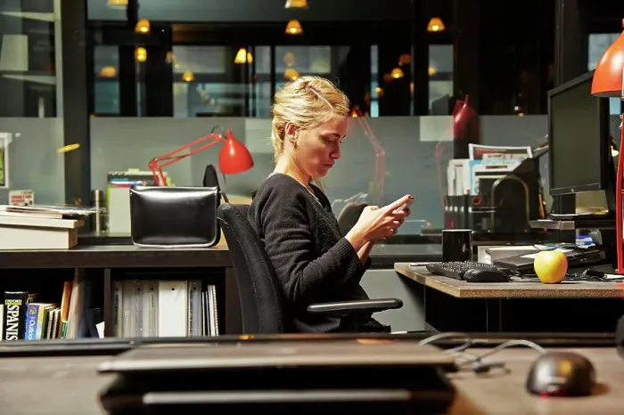 Framed Print : Focused professional working late in a modern office