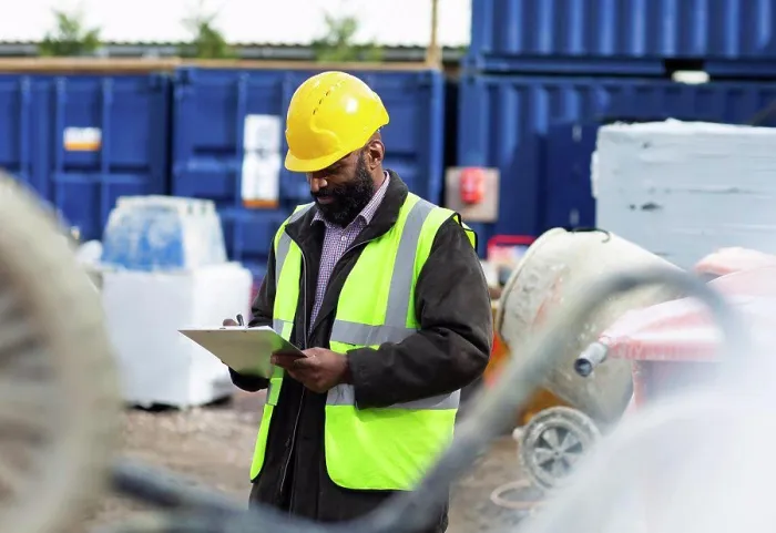 Framed Print : Foreman with clipboard at construction site Framed Print : Foreman with clipboard at construction site
