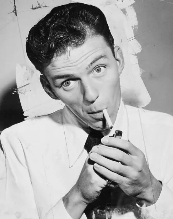 Framed Print : Frank Sinatra lighting a cigarette Framed Print : Frank Sinatra lighting a cigarette