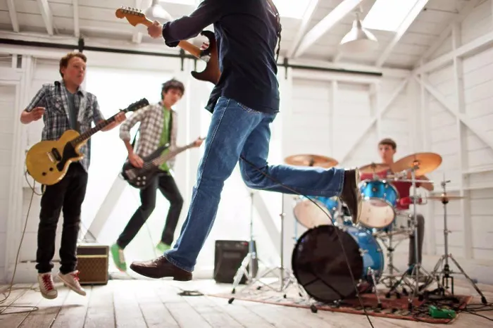 Framed Print : Friends playing musical instruments together Framed Print : Friends playing musical instruments together