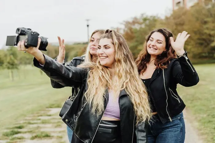Framed Print : Friends taking selfie with camera Framed Print : Friends taking selfie with camera