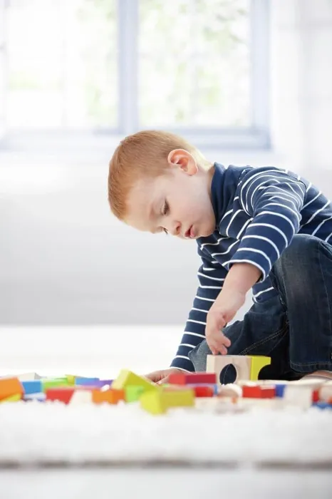 Framed Print : Gingerish boy playing with cubes Gingerish little boy playing with building cubes at home on floor Framed Print : Gingerish boy playing with cubes Gingerish little boy playing with building cubes at home on floor