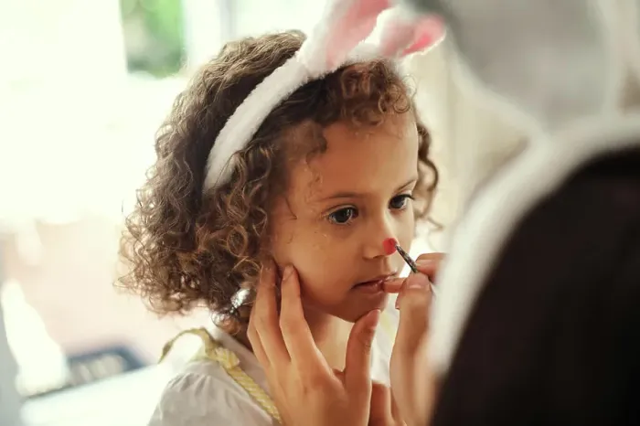 Framed Print : Girl, face paint and bunny ears for Easter