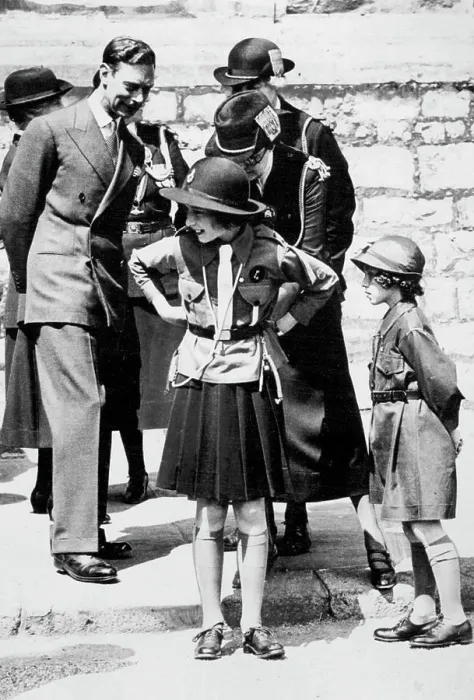 Framed Print : Girl Guides Inspection At Windsor A charming incident during the March Past of the Girl Guides Framed Print : Girl Guides Inspection At Windsor A charming incident during the March Past of the Girl Guides