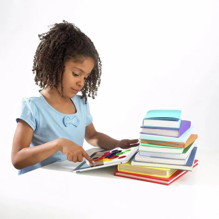 Framed Print : Girl using tablet computer Framed Print : Girl using tablet computer