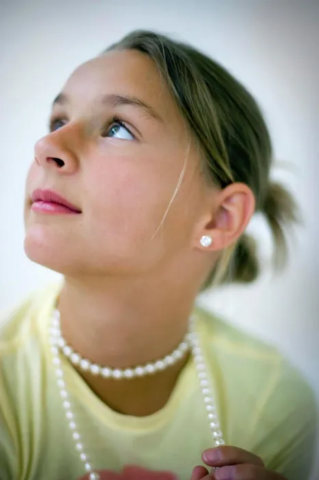 Framed Print : Girl wearing pearl necklace