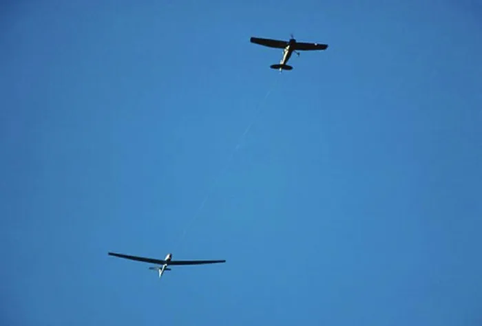 Framed Print : Glider Being Towed by Airplane Framed Print : Glider Being Towed by Airplane