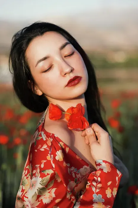 Framed Print : Gorgeous model in red dress holding poppy flowers Framed Print : Gorgeous model in red dress holding poppy flowers