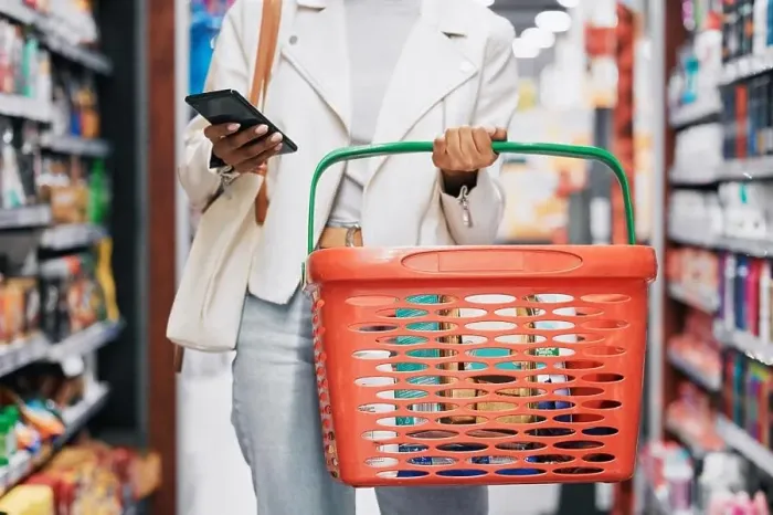 Framed Print : Grocery shopping, retail and black woman with phone in store