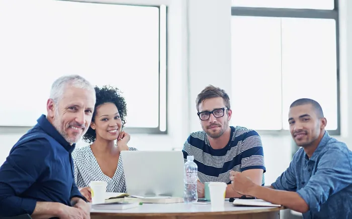 Framed Print : Group, business people and manager with laptop on table Framed Print : Group, business people and manager with laptop on table
