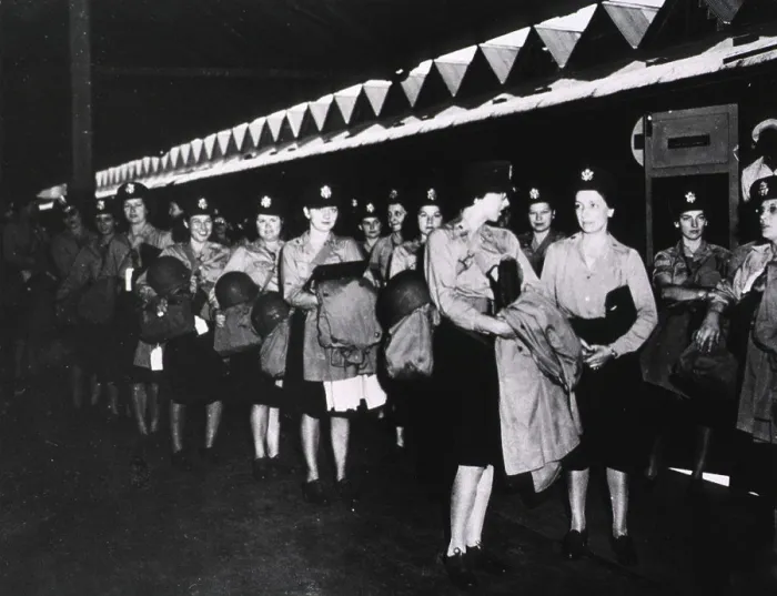 Framed Print : A group of female military nurses in uniform stands in rows at an unidentified location Framed Print : A group of female military nurses in uniform stands in rows at an unidentified location