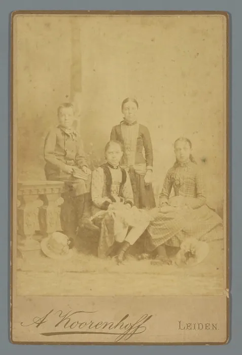 Framed Print : Group portrait of three girls and a boy Framed Print : Group portrait of three girls and a boy