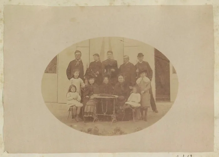Framed Print : Group portrait of three men, five women and four children standing at a table in France Framed Print : Group portrait of three men, five women and four children standing at a table in France