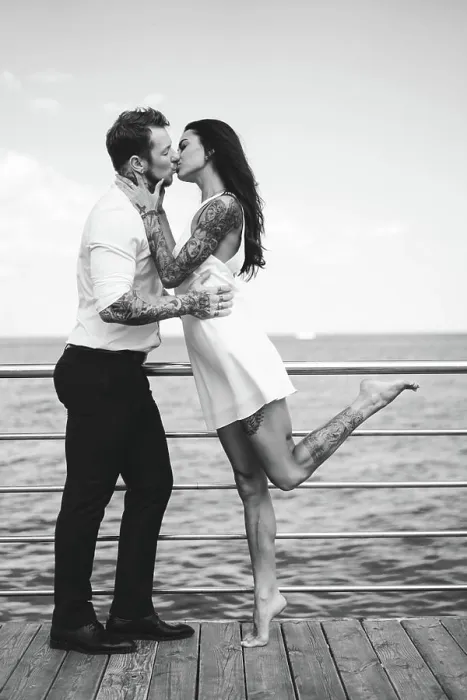 Framed Print : Guy and girl on the sea pier Guy and girl on the sea pier posing on the camera Framed Print : Guy and girl on the sea pier Guy and girl on the sea pier posing on the camera