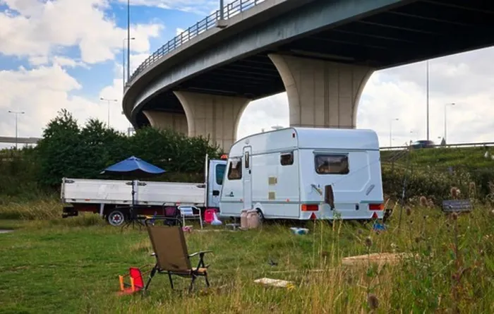 Framed Print : Gypsy caravan and truck on grassland under the flyover, Yorkshire, England Framed Print : Gypsy caravan and truck on grassland under the flyover, Yorkshire, England