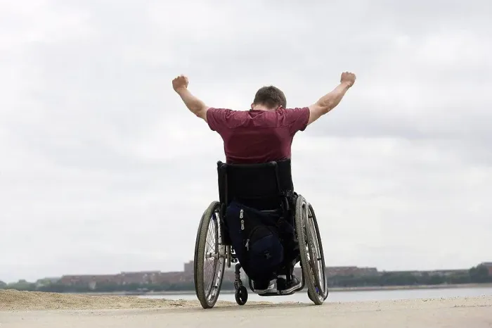 Framed Print : Handicapped man on a wheel chair Framed Print : Handicapped man on a wheel chair