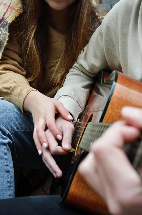 Framed Print : the hands of a girl and a boy on a guitar Framed Print : the hands of a girl and a boy on a guitar