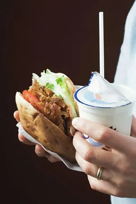 Framed Print : Hands holding döner kebab and ayran Framed Print : Hands holding döner kebab and ayran