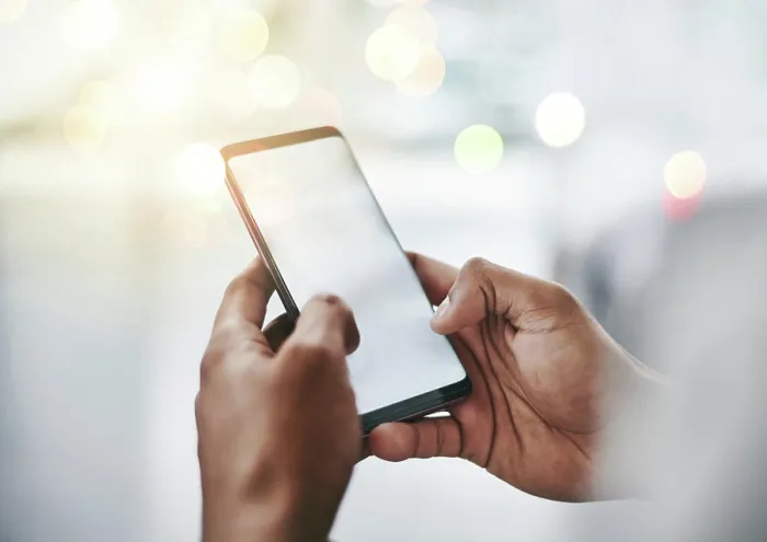 Framed Print : Hands, typing and person with phone screen in office for email
