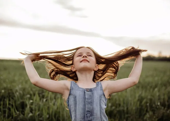 Framed Print : Happy 5 years old girl in a green wheat field with long hair at sunset Framed Print : Happy 5 years old girl in a green wheat field with long hair at sunset