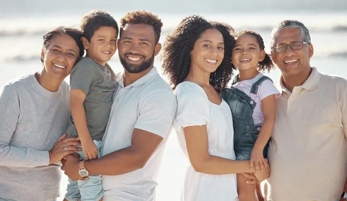 Framed Print : Happy, big family and portrait smile on a beach holiday together in happiness for outdoors