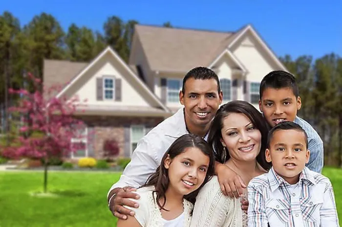 Framed Print : Happy hispanic family portrait in front of beautiful house Framed Print : Happy hispanic family portrait in front of beautiful house