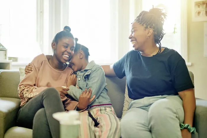 Framed Print : Happy, laughing and smile with mother and daughter on sofa for bonding