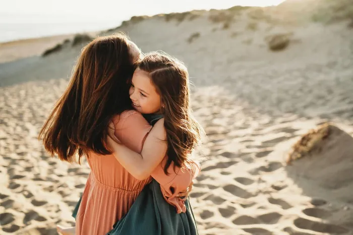 Framed Print : Happy Mother daughter hugging smiling beach summer sunset Framed Print : Happy Mother daughter hugging smiling beach summer sunset