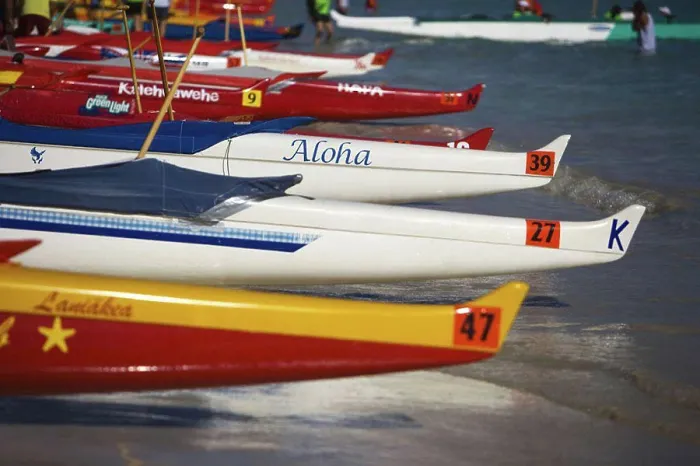 Framed Print : Hawaii, Oahu, Kailua, Lineup of colorful outrigger canoes on the shoreline at a canoe race