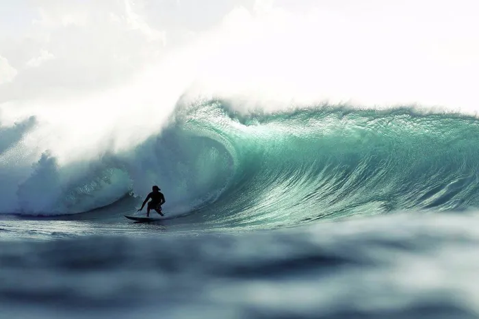 Framed Print : Hawaii, Oahu, North Shore, Silhouette of a surfer inside the barrel of a large wave. Editorial Use Only