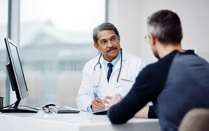 Framed Print : Healthcare, office and doctor in a consultation with a patient in discussion on a diagnosis in the clinic Framed Print : Healthcare, office and doctor in a consultation with a patient in discussion on a diagnosis in the clinic