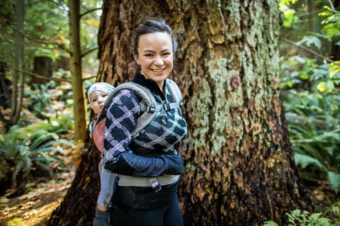 Framed Print : Healthy and fit mother wearing baby carrier, hiking Framed Print : Healthy and fit mother wearing baby carrier, hiking