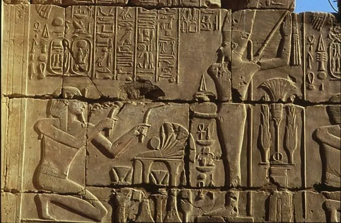 Framed Print : Detail of hieroglyphics carved into stone wall of Karnak Temple, Karnak, Luxor, Egypt Framed Print : Detail of hieroglyphics carved into stone wall of Karnak Temple, Karnak, Luxor, Egypt
