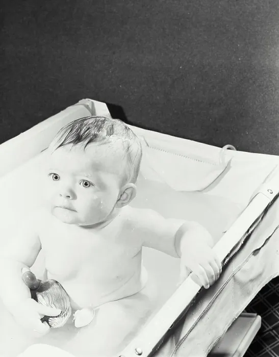 Framed Print : High angle view of a baby in a bathtub