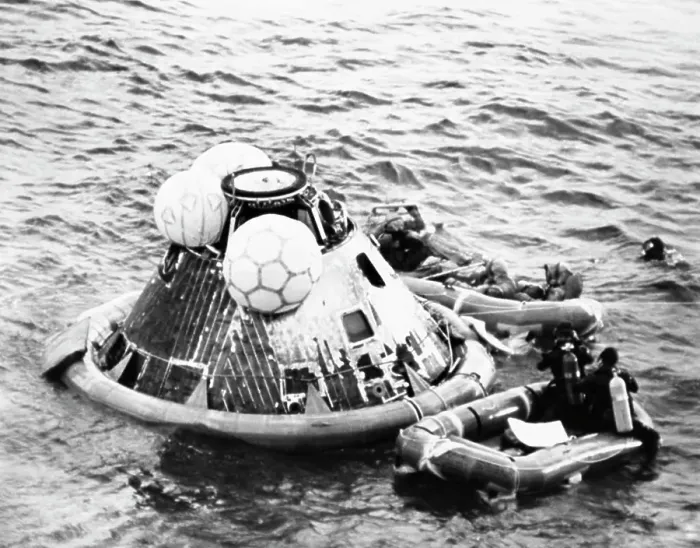 Framed Print : High angle view of a rescue squad near a space capsule in the sea Framed Print : High angle view of a rescue squad near a space capsule in the sea