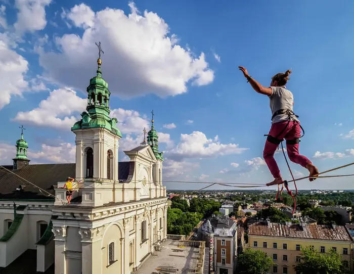 Framed Print : Highlining with Cathedral in the background, Urban Highline Festival, Lublin, Lublin Voivodeship, Poland, Europe
