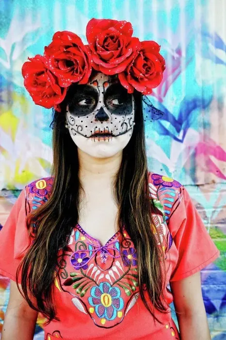 Framed Print : Hispanic woman wearing skull face paint