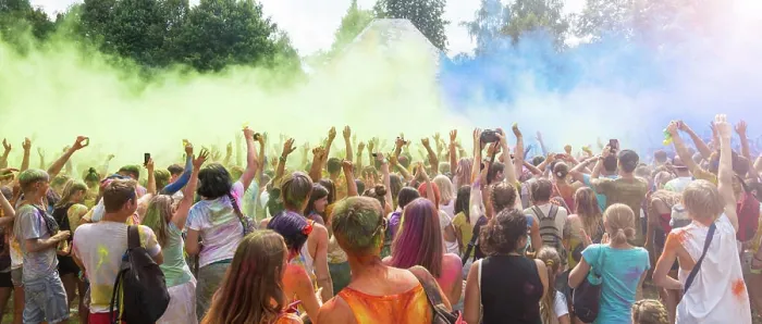Framed Print : Holi Festival celebration Celebrants dancing during the color Holi Festival Framed Print : Holi Festival celebration Celebrants dancing during the color Holi Festival