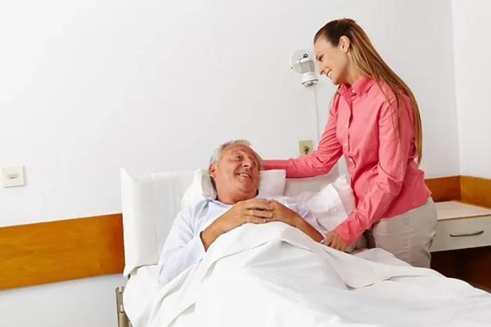 Framed Print : Hospital visit from the family daughter for sick senior