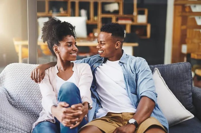Framed Print : House, talk and black couple on sofa Framed Print : House, talk and black couple on sofa