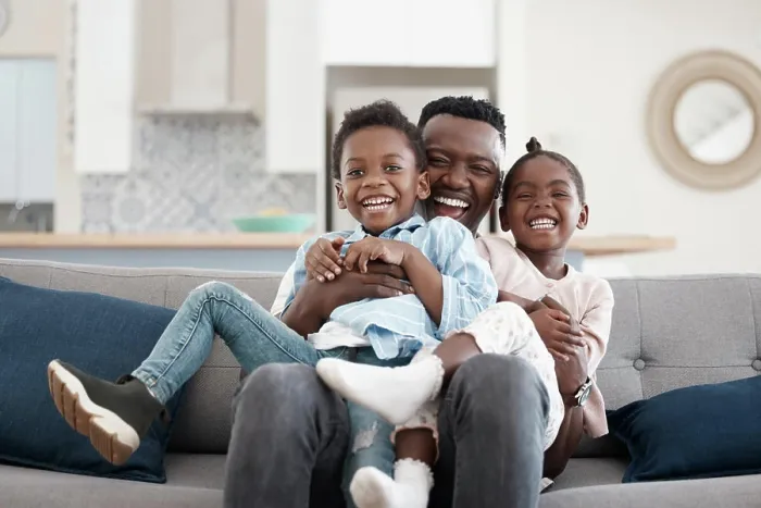 Framed Print : Hug, happy and portrait of a father with children on the sofa for playing Framed Print : Hug, happy and portrait of a father with children on the sofa for playing