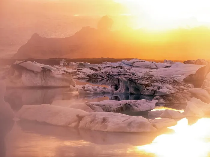 Framed Print : Icebergs floating in Jokulsarlon glacier lagoon lake at sunset