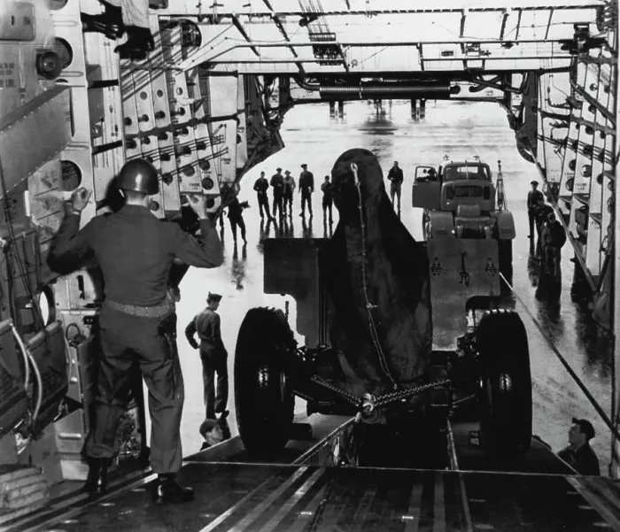 Framed Print : It's Spacious -- Giant Globemaster C-124 is loading 155 mm howitzer