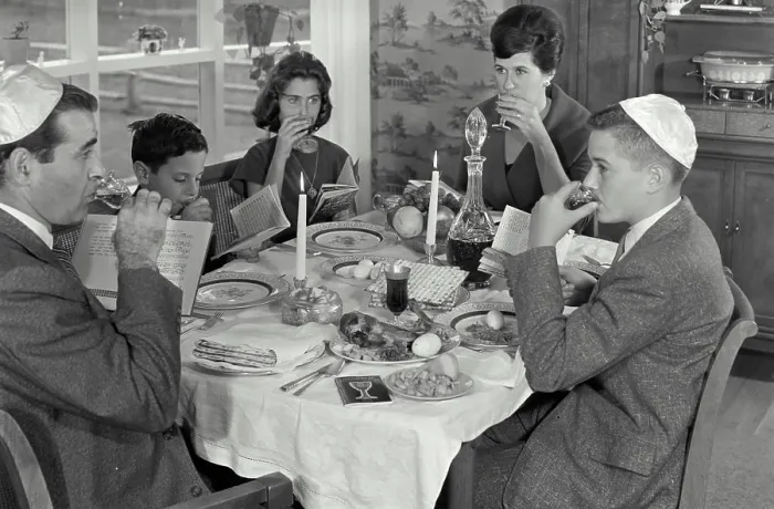 Framed Print : Jewish family taking Seder dinner during Passover festival