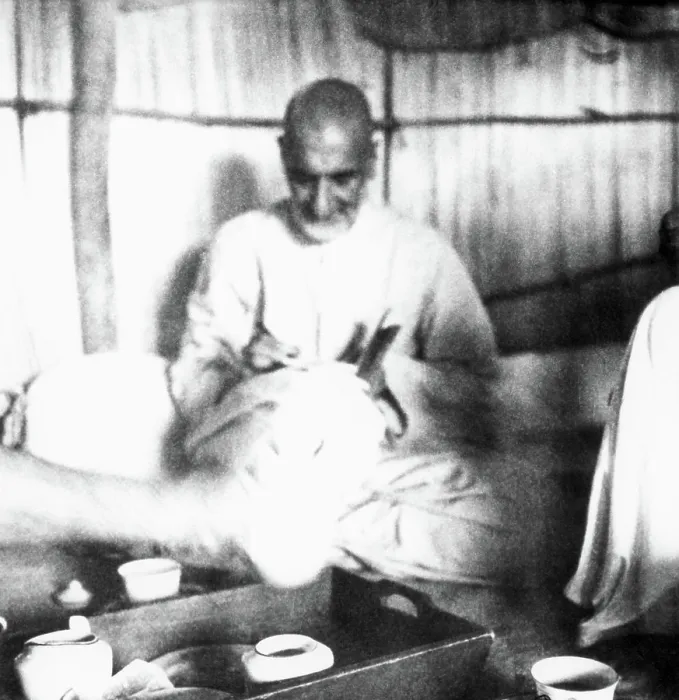 Framed Print : Khan Abdul Gaffar Khan, sitting in a hut and writing during his visit of the riot stricken areas of Bihar