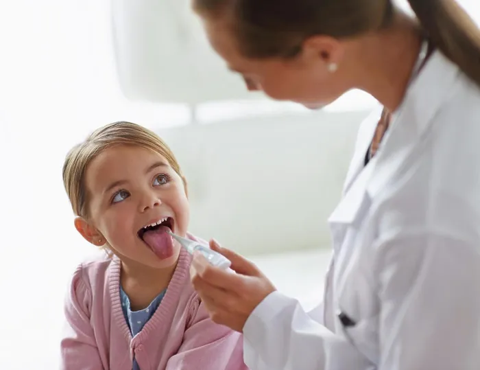 Framed Print : Kid, doctor and thermometer in mouth for medical risk Framed Print : Kid, doctor and thermometer in mouth for medical risk