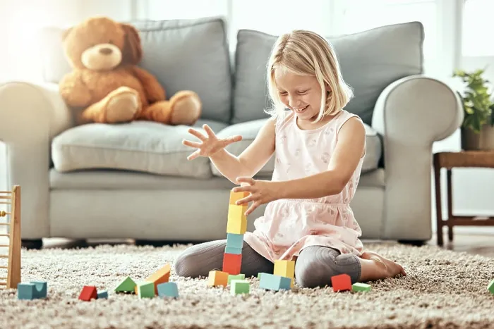 Framed Print : Kid, playing alone and toys on living room floor Framed Print : Kid, playing alone and toys on living room floor